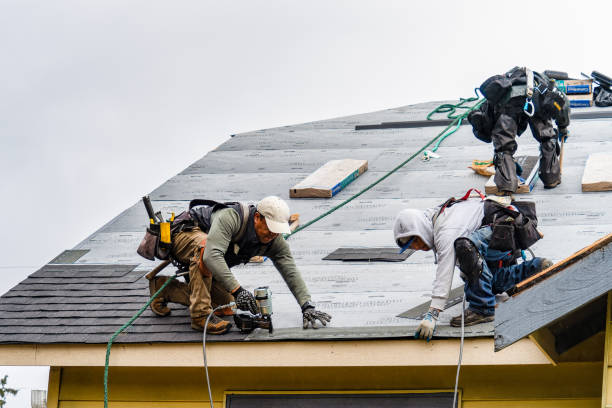 Professional Roofing technician working in Melville, NY